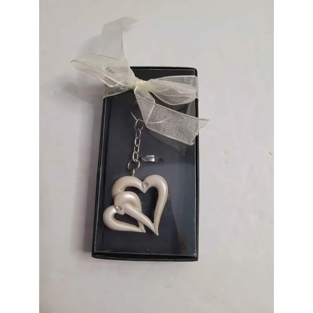 4 Pearl white double heart keychain.
